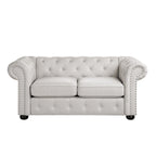 Causeuse Chesterfield capitonnée