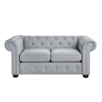 Causeuse Chesterfield capitonnée