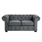 Causeuse Chesterfield capitonnée