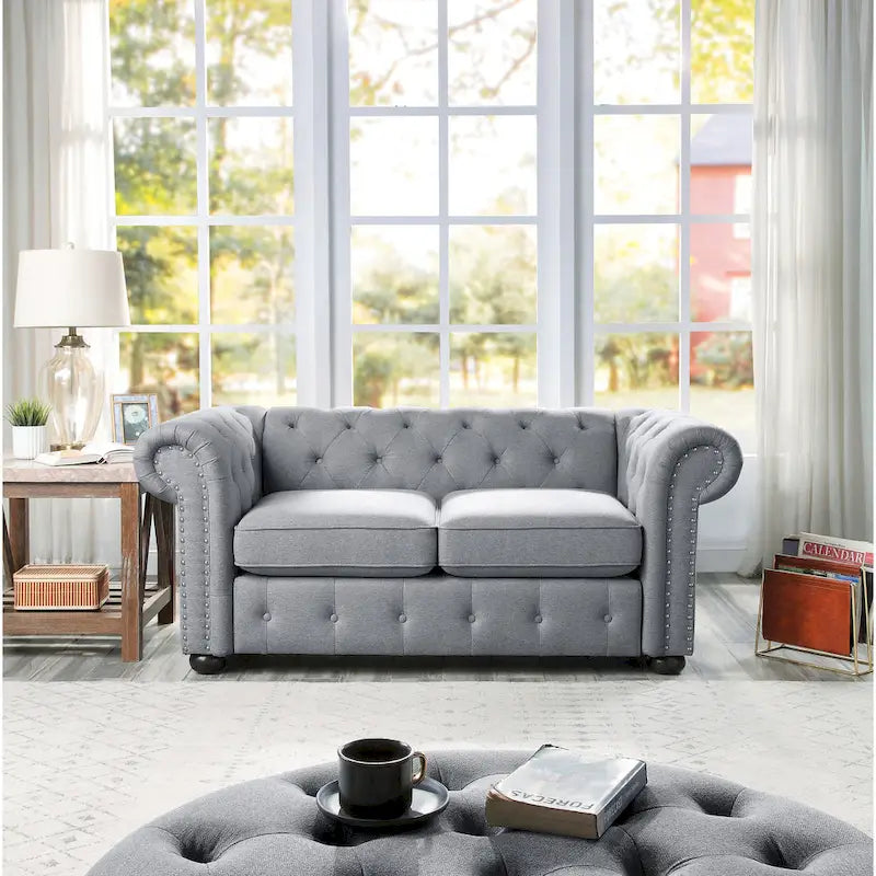 Causeuse Chesterfield capitonnée