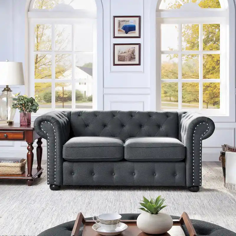 Causeuse Chesterfield capitonnée