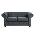 Causeuse Chesterfield capitonnée