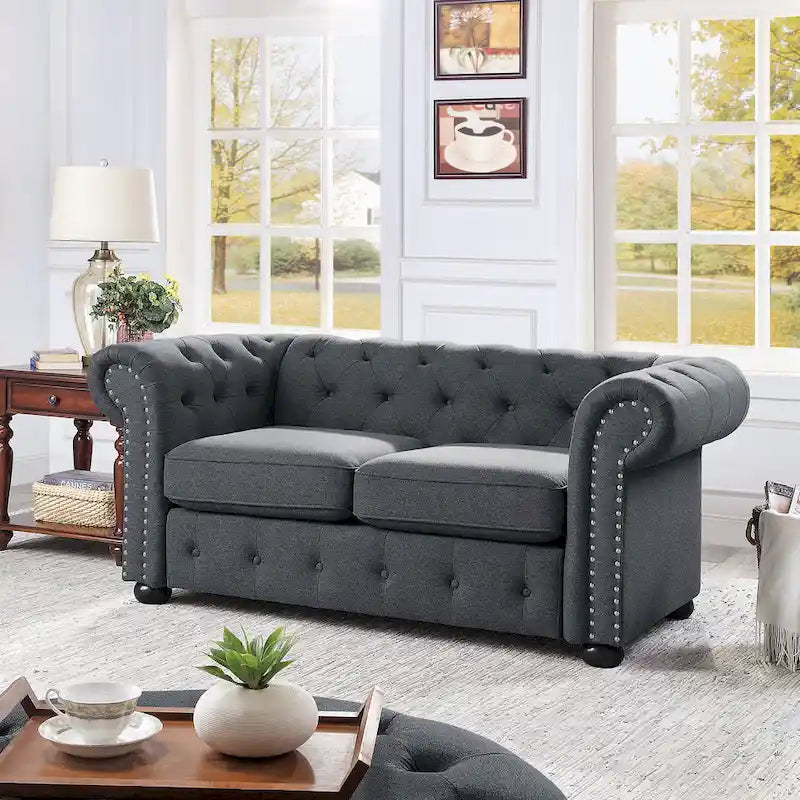Causeuse Chesterfield capitonnée