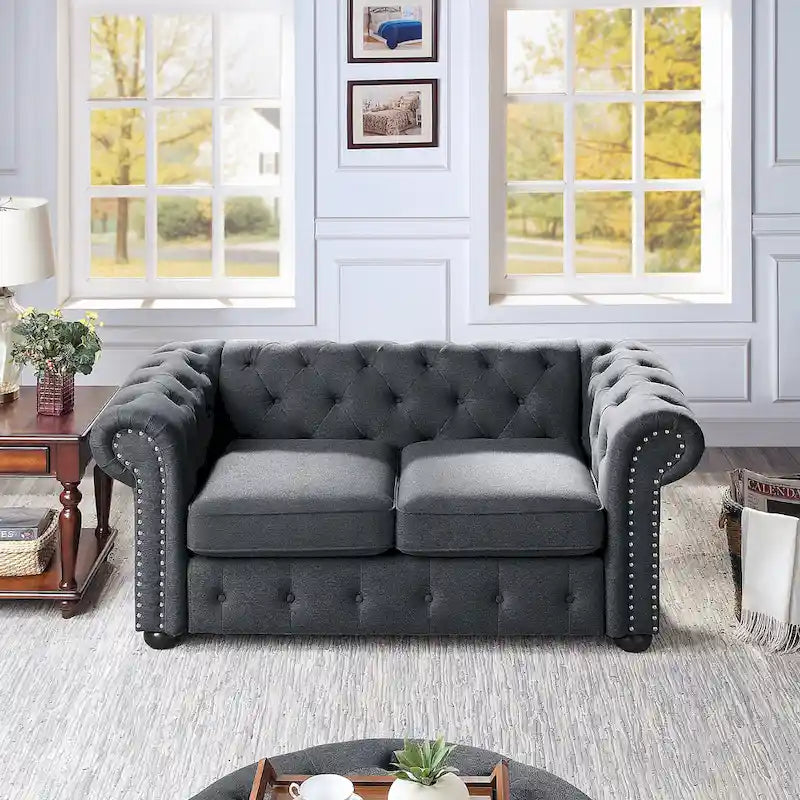 Causeuse Chesterfield capitonnée