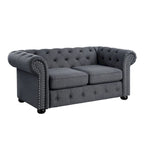 Causeuse Chesterfield capitonnée