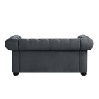 Causeuse Chesterfield capitonnée