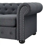 Causeuse Chesterfield capitonnée
