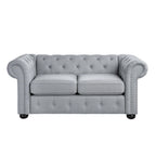 Causeuse Chesterfield capitonnée