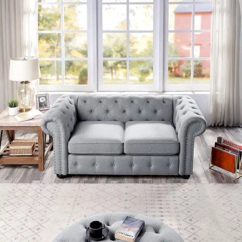 Causeuse Chesterfield capitonnée