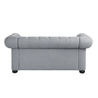 Causeuse Chesterfield capitonnée