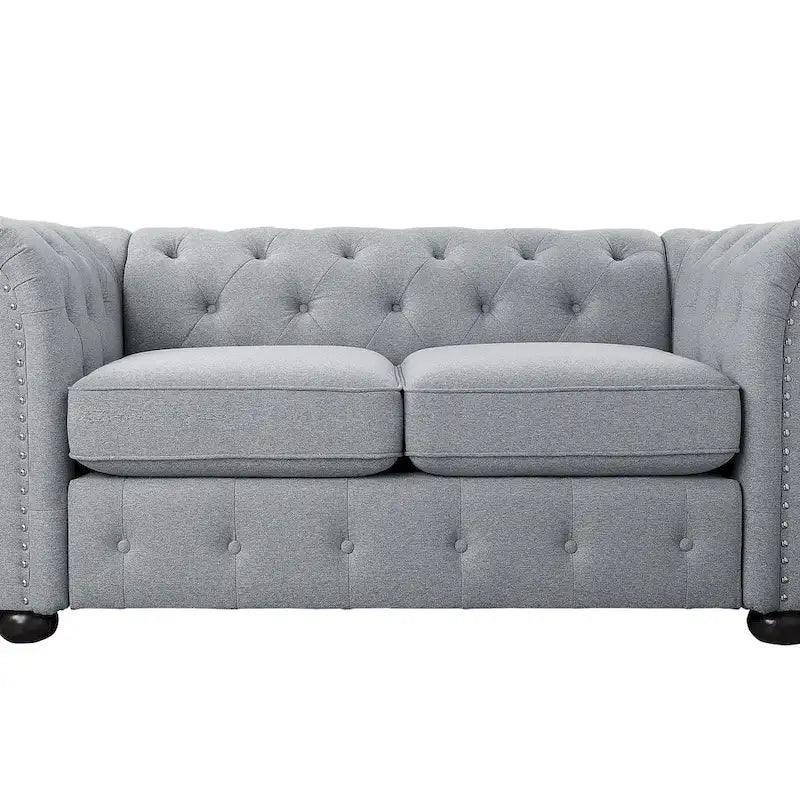 Causeuse Chesterfield capitonnée