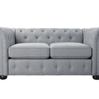 Causeuse Chesterfield capitonnée
