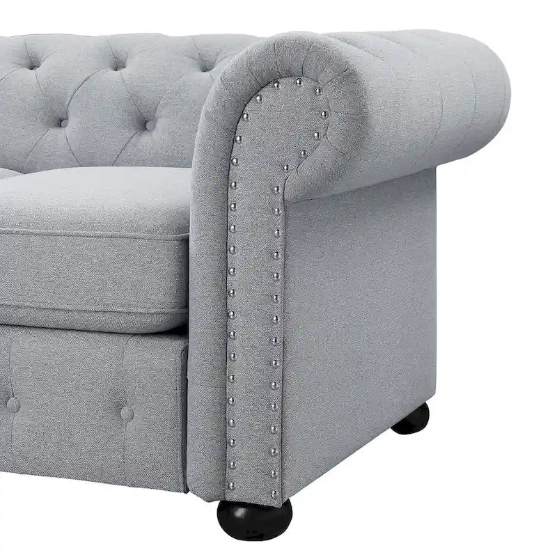 Causeuse Chesterfield capitonnée