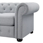 Causeuse Chesterfield capitonnée