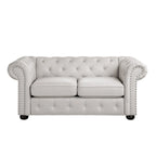 Causeuse Chesterfield capitonnée