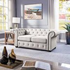Causeuse Chesterfield capitonnée
