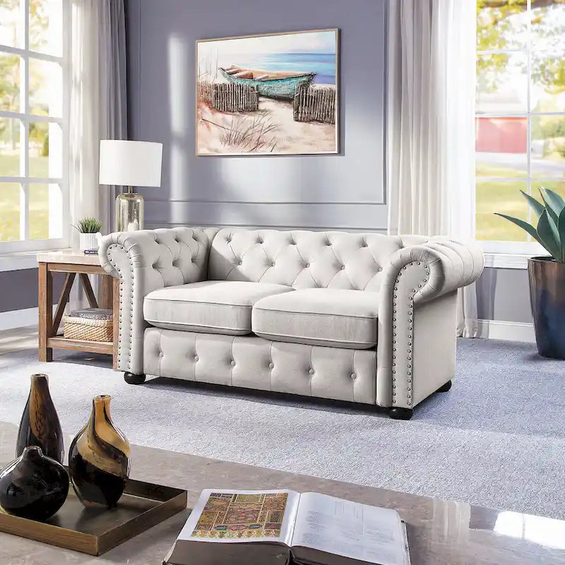 Causeuse Chesterfield capitonnée