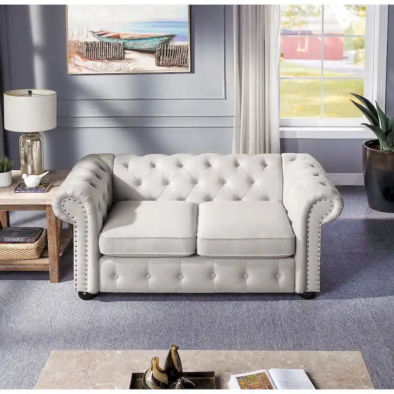 Causeuse Chesterfield capitonnée