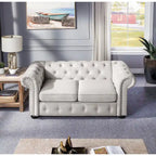 Causeuse Chesterfield capitonnée
