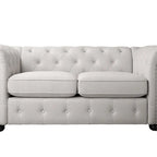 Causeuse Chesterfield capitonnée