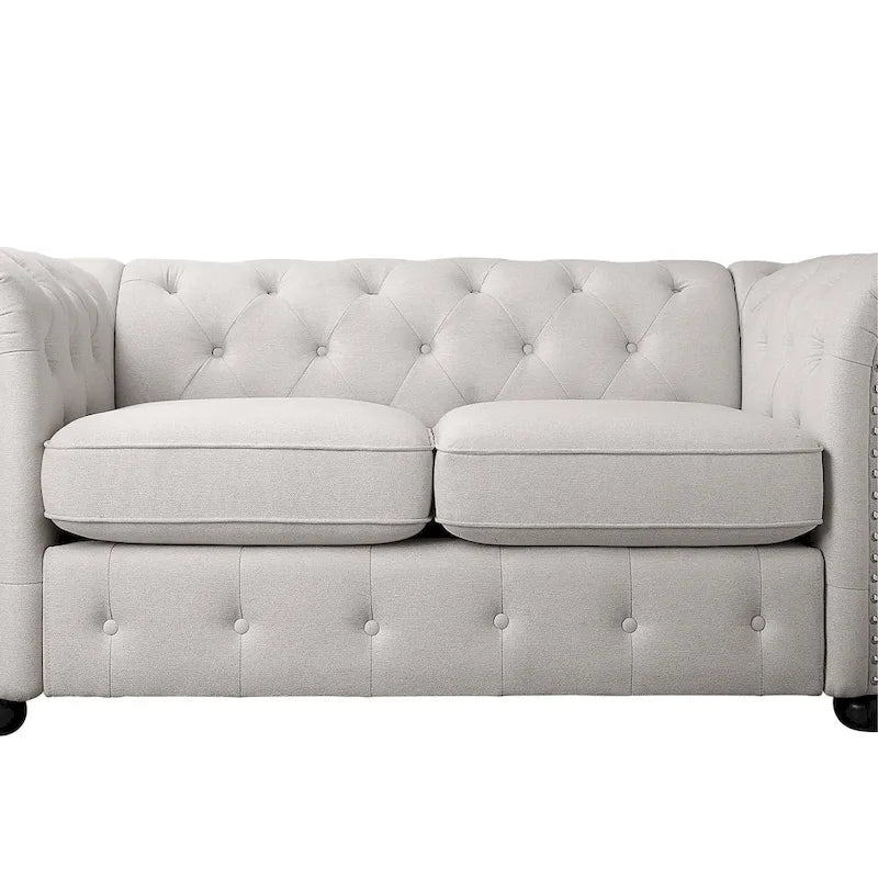 Causeuse Chesterfield capitonnée