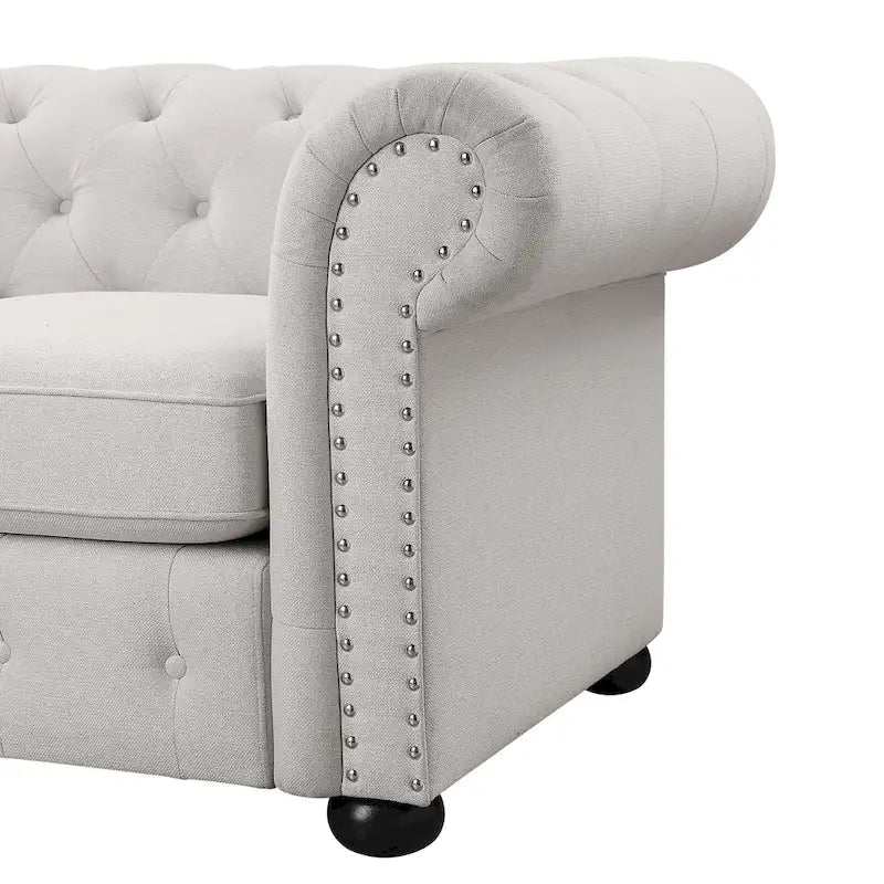 Causeuse Chesterfield capitonnée