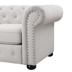 Causeuse Chesterfield capitonnée