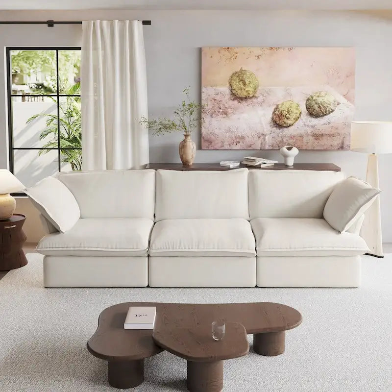 Canapé d'angle moderne et minimaliste avec rembourrage en duvet et housses de coussin amovibles