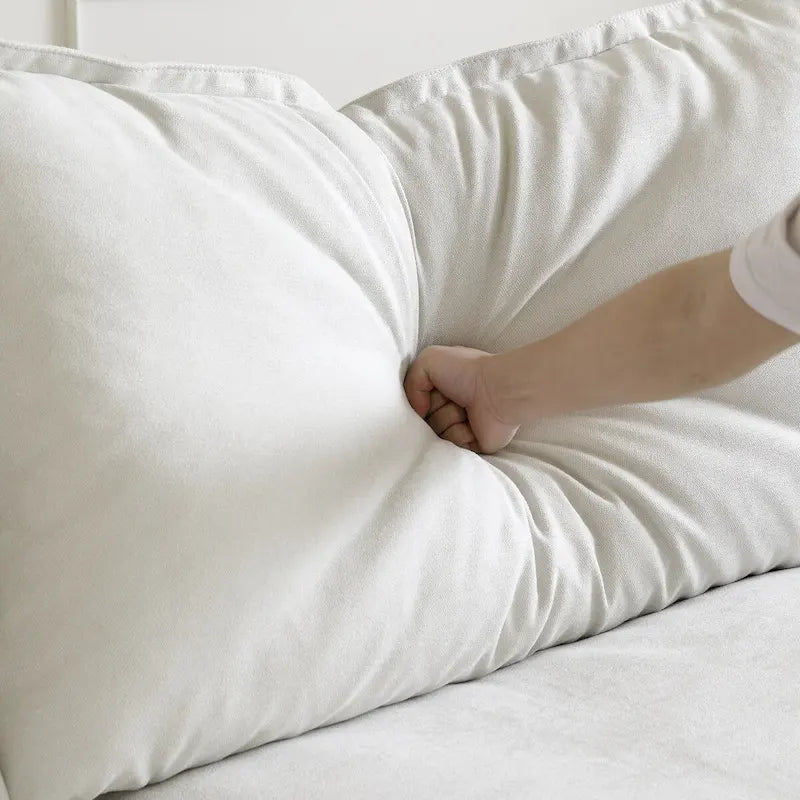 Canapé d'angle moderne et minimaliste avec rembourrage en duvet et housses de coussin amovibles